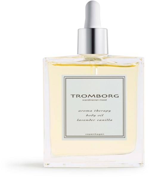 Eine Glasflasche mit Tropferbehälter, enthält gelbe Körperöl, beschriftet 'Tromborg' mit Lavendel- und Vanilleduftnotizen.