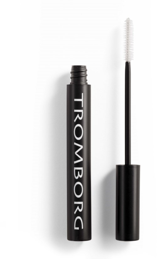 Ein schwarzer Mascara-Röhrchen mit weißer Bürste. Das Röhrchen hat den Text 'TROMBORG'.