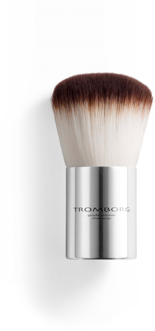 A makeup brush with a silver handle and soft bristles, labeled Tromborg, against a white background.