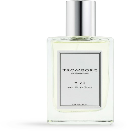 Eine klare Glasparfümflasche mit silberner Kappe, beschriftet 'TROMBORG #15'.
