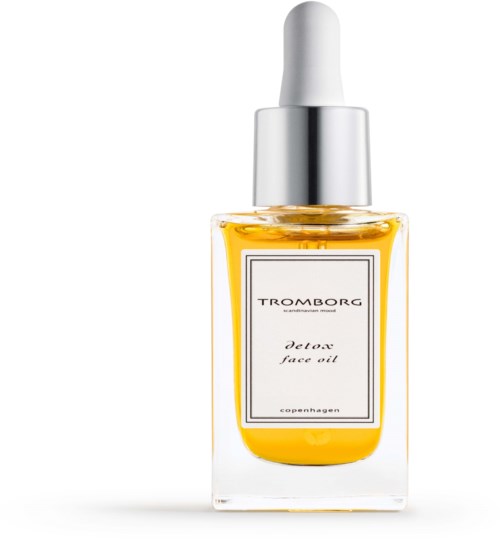 Eine klare Flasche mit gelber Flüssigkeit, silberner Kappe und Weißpipette. Etikett lautet "Detox face oil."