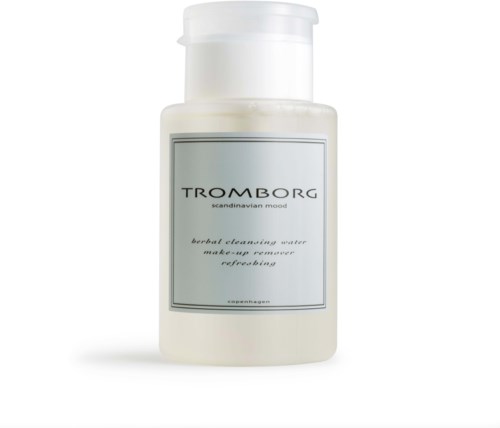 A white bottle with a label that reads 'TROMBORG', describing it as herbal cleansing water and makeup remover.