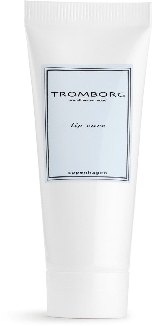 Eine weiße Tube mit einem Etikett, das 'Tromborg lip cure' aus Kopenhagen sagt.