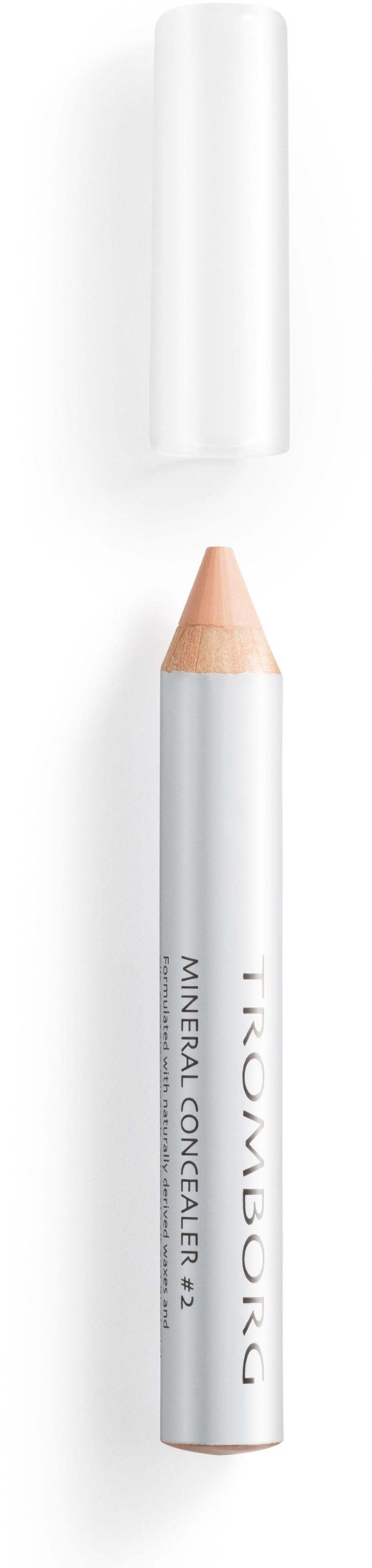A white pencil with a beige tip, next to a white cap, on a white background.