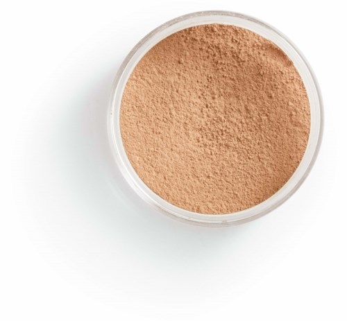 A round container with beige powder on a white background.