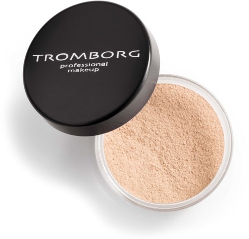 A round container with a black lid labeled 'TROMBORG professional makeup' showing peach-colored powder inside.
