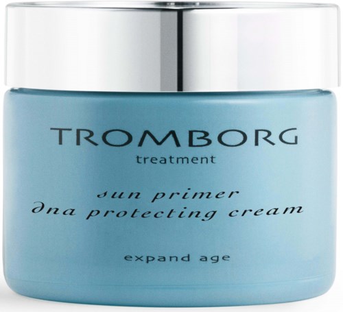 Eine lichtblaue Dose mit silbernem Deckel, beschriftet Tromborg Sonnenprimer und schützende Creme für die Haut.