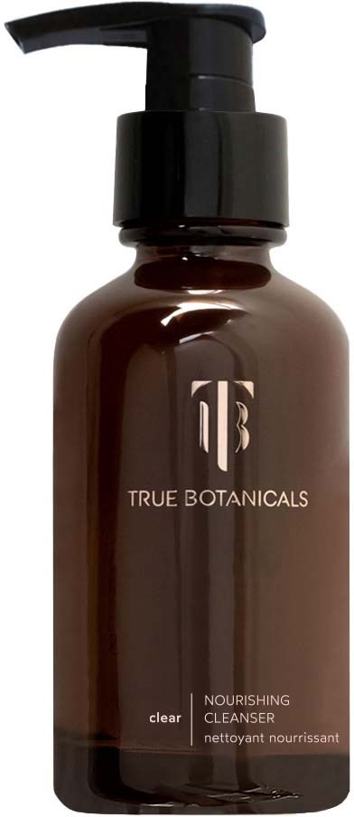 A brown bottle with a black pump labeled 'True Botanicals Nourishing Cleanser' and a logo.