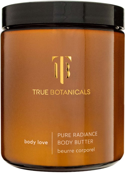 A brown jar with a black lid labeled 'TRUE BOTANICALS' and 'PURE RADIANCE BODY BUTTER.'