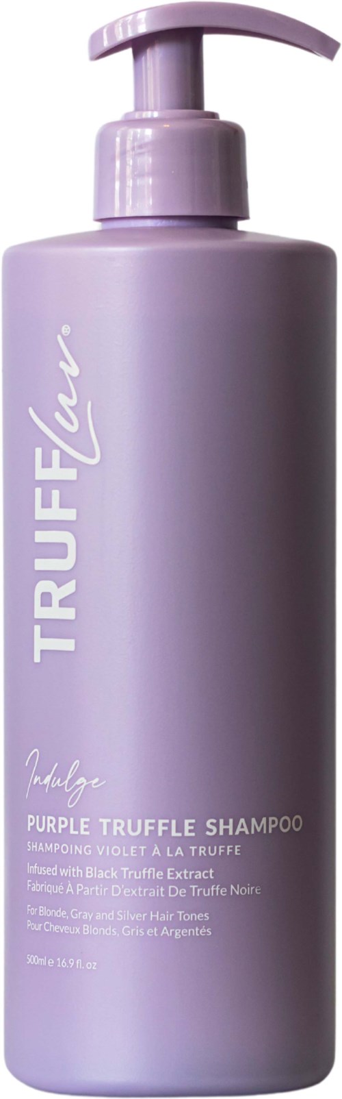 Lila shampoo fles met pomp, gemarkeerd 'TRUFFLE,' en tekst over violet en UV-formules. Strak en eenvoudig ontwerp.