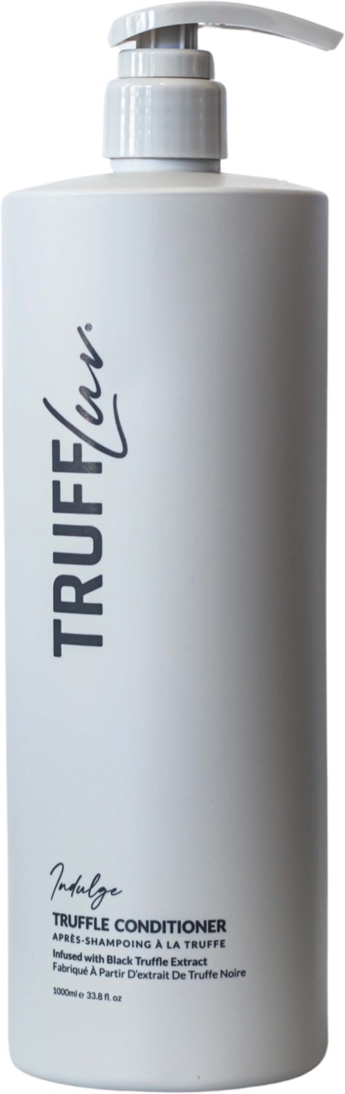 Een witte fles met pomp, gemarkeerd 'TRUFFLEFLUR' en 'Truffle Conditioner' in zwarte tekst.
