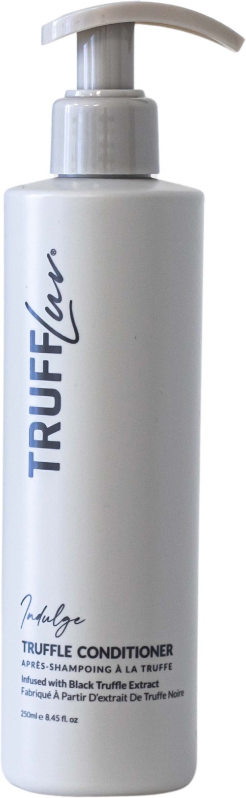Een witte fles met pomp, gelabeld 'TRUFFLURF' en 'Conditioner', waarschijnlijk voor haarverzorging.