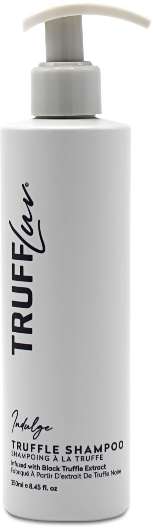 Witte fles met pomp, gelabeld 'TRUFFLEX' en 'Truffle Shampoo', bevat truffeluitstek voor haarverzorging.