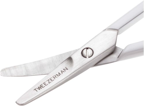 A small, sharp sewing scissors with white handles and the name 'TweezerMan' engraved on one blade.