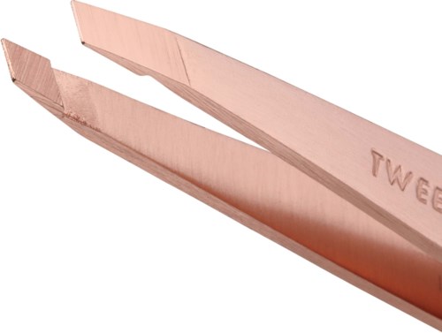 A pair of copper tweezers with one flat and one pointed tip.
