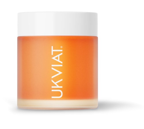 Een kleine pot met witte deksel, oranje label en oranje crème erin. Het label zegt "UKVIAT."