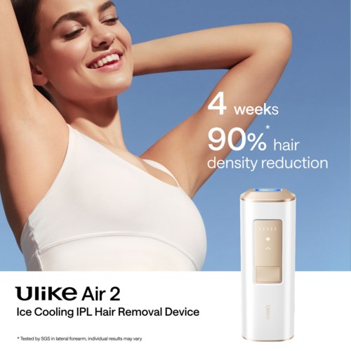 A smiling woman with her arms behind her head, promoting Ulike Air 2 ice cooling device for hair removal. 