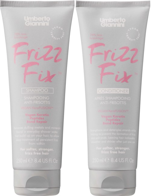 Two hair care products, shampoo and conditioner, with pink and gray packaging, labeled as anti-folliculitis and vegan.