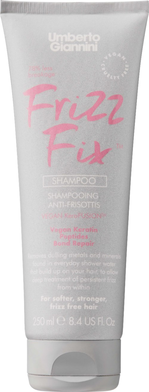 Eine weiße Tube Shampoo namens 'Frizz Fix' von Umberto Giannini. Es verspricht, Frizz zu kontrollieren und Glanz zu verleihen.