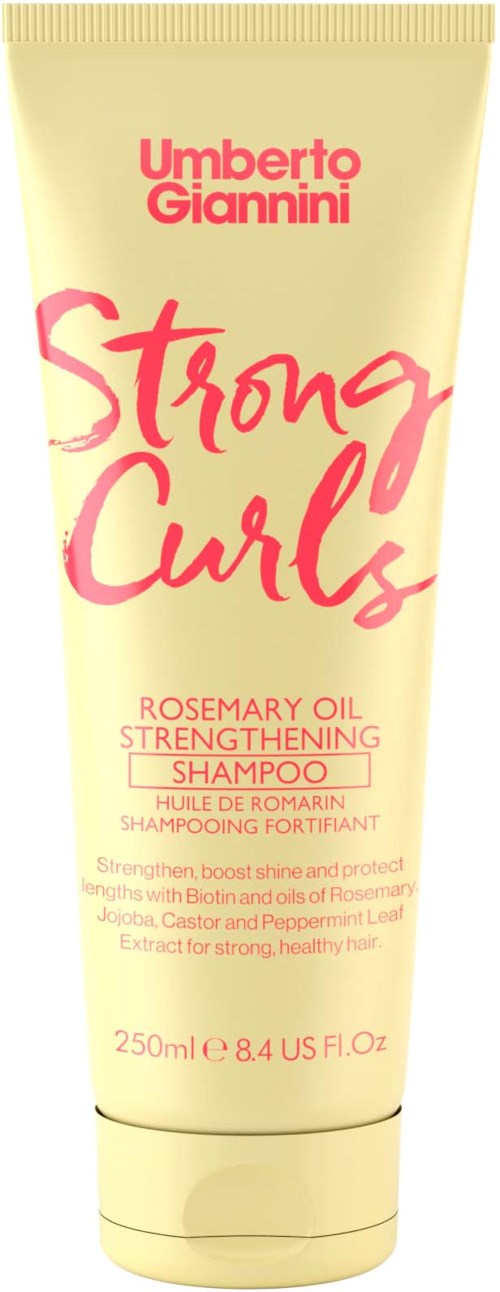 Een beige tube met roze en oranje tekst voor sterke krullen shampoo, bevat verstevigende en glansverhogende eigenschappen.