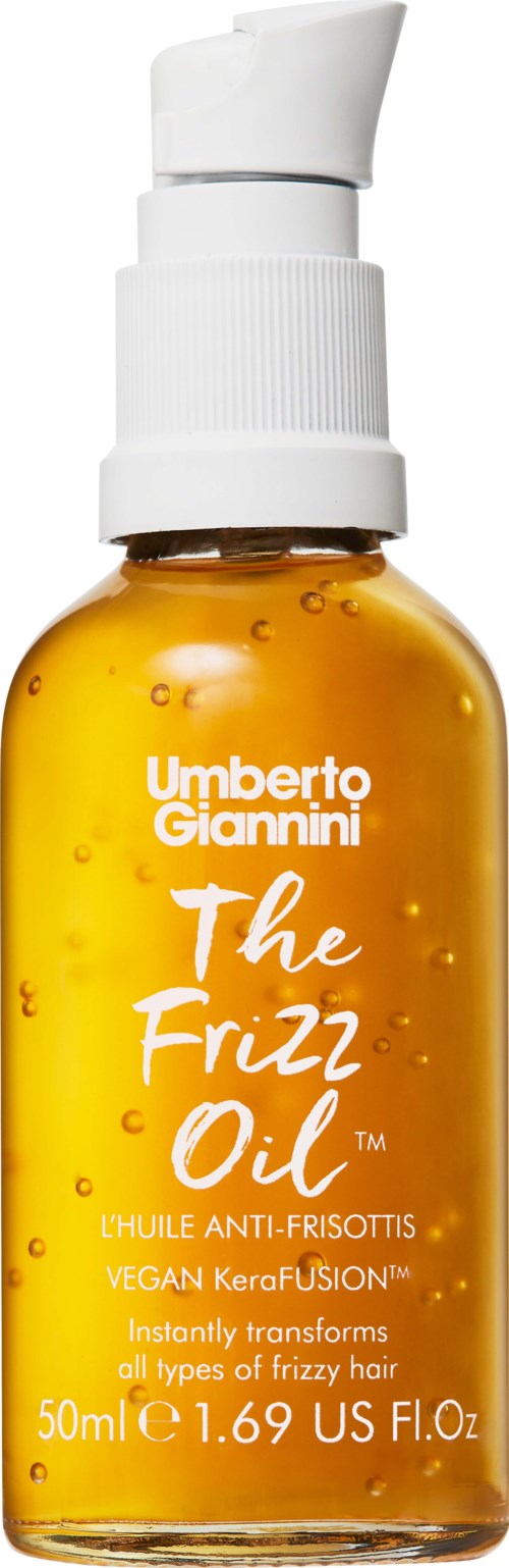 En liten orangefärgad sprayflaska med vit pump och etikett, innehållande frisoffrizz-olja av Umberto Giannini.