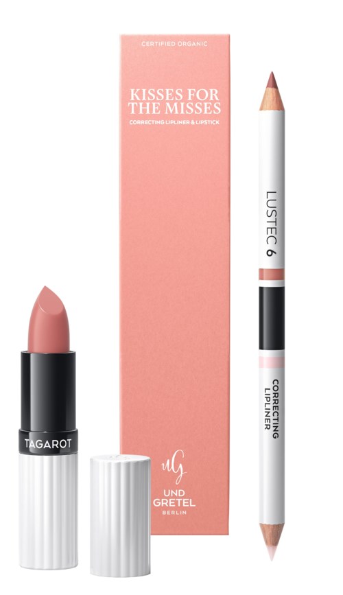 Lippenstift und Lippenstift aus der "Kisses for the Misses" Kollektion, rosa Verpackung, weiße und schwarze Accessoires.