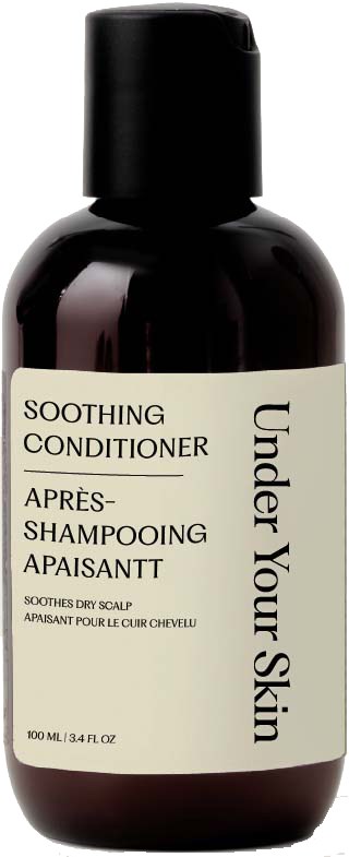 En mörkbrun flaska med scalp soothing balsam med svart lock och beige etikett.