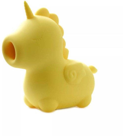Yellow unicorn-shaped object with a horn and small features, appears to be a toy or figurine.