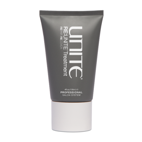 Graue Tube mit der Aufschrift 'Unite Rejuvenate Treatment' für Haare, mit weißem Deckel.