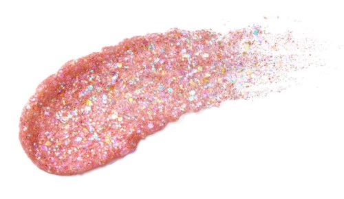 Roze glinsterend voorwerp met staart, dat oplost in deeltjes, glanzend en getextureerd.