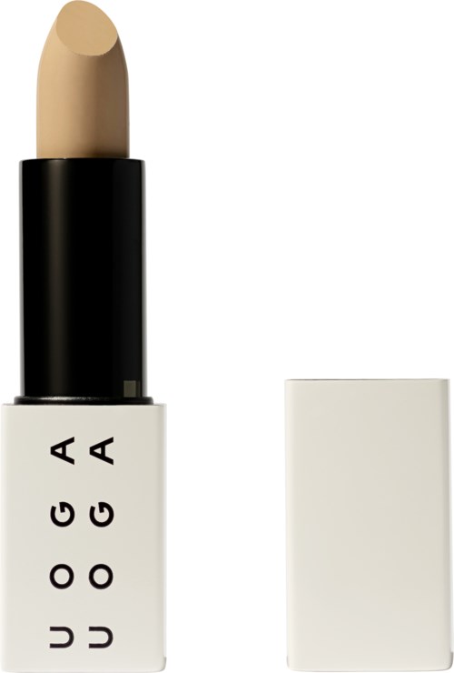 Ein beigefarbener Lippenstift in einem weißen Zylinder mit schwarzem und weißem Text, Deckel entfernt.