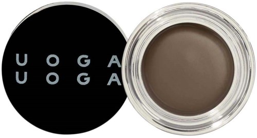 Ein runder Behälter mit brauner Gel oder Creme und einem schwarzen Deckel mit der Aufschrift 'UOGA'.