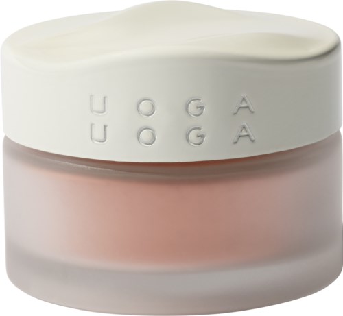 Creme in einem Glas mit 'UOGA UOGA' auf dem Deckel, hellrosa und weiß.