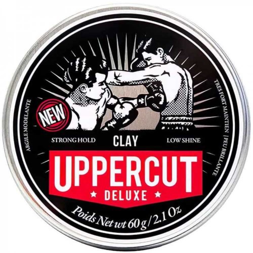 A sporty circular logo features two boxers fighting, with words like "NEW" and "UPPERCUT DELUXE", and details about product weight.