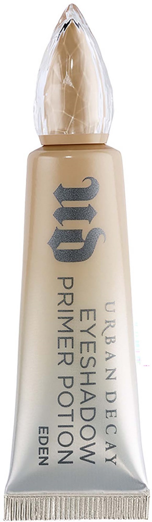 Eine Tube Urban Decay Lidschatten-Grundierung mit spitzem Applikator, beige Farbe und schwarzem Text.