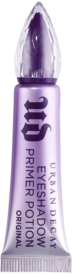 En liten tub med Urban Decay ögonskuggspreprimer med lila förpackning och spetsig applikator.