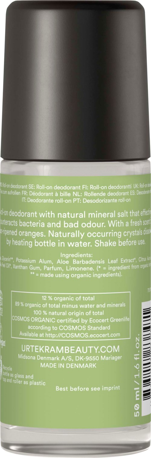 Een groene en zwarte roll-on deodorantfles met tekst over ingrediënten en gebruiksinstructies.