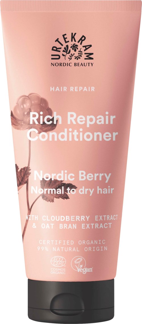 Roze tube haarconditioner met kersenbloesem illustratie. Tekst benadrukt dat het voor droog haar is, met bessen- en haverextract.