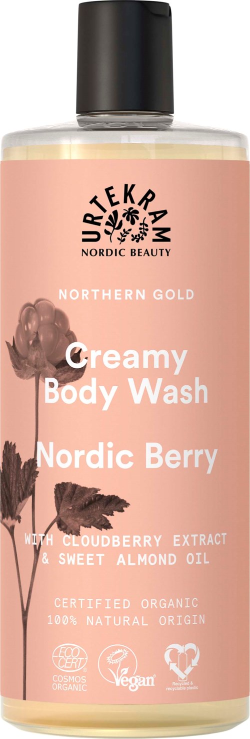 Eine rosa Flasche mit der Aufschrift 'Creamy Body Wash Nordic Berry' und Bildern von Beeren und Blättern.