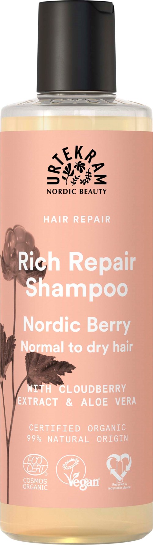 A pink bottle of shampoo with black cap, labeled for hair repair, containing Nordic berry, cloudberry, aloe vera, and organic ingredients.