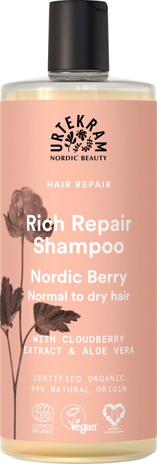 A shampoo bottle labeled 'Rich Repair Shampoo' with 'Nordic Berry' for normal to dry hair and natural ingredients.