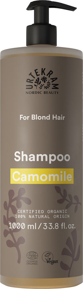 En beige schampoflaska med svart pump, märkt för blont hår, med växtillustrationer och ekologiska certifieringssymboler.