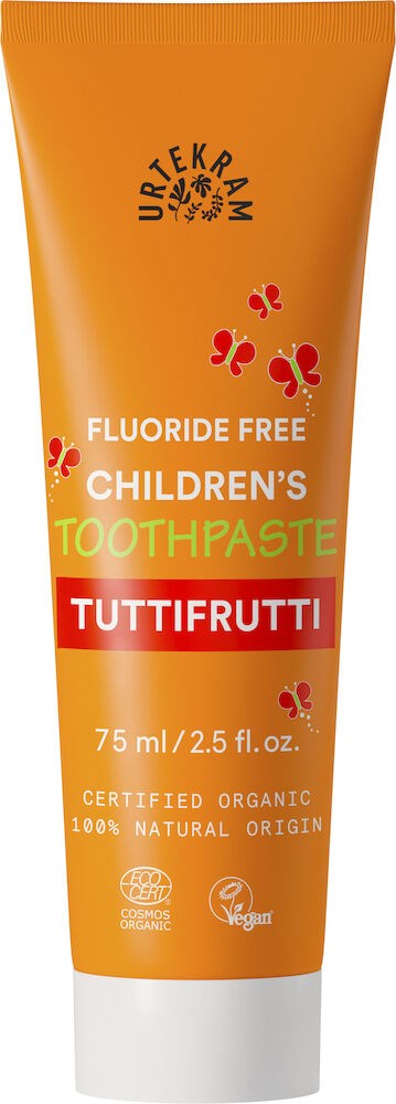 A bright orange tube of children's fluoride-free toothpaste with red, yellow, and green text and butterfly illustrations.