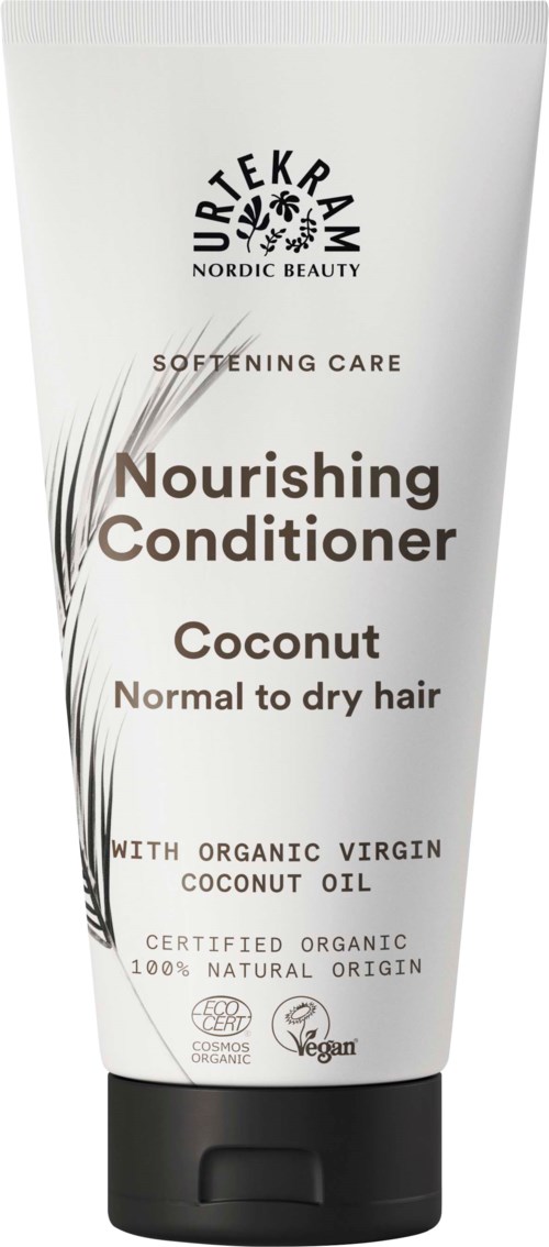 Witte tube met voedende conditioner met zwarte dop, tekst over kokos voor droog haar, biologisch en veganistisch.