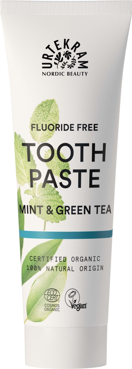 A white tube of fluoride-free toothpaste with mint and green tea, organic, vegan, and certified, from Nordic Beauty.