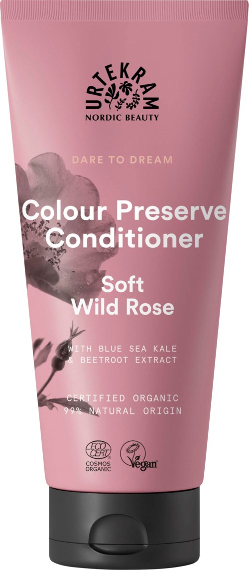 Pink tube of hair conditioner with a rose scent, containing blue sea kale and beetroot extract, organic and vegan.