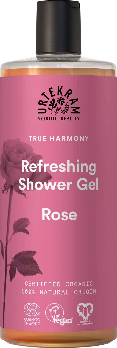 Een roze flesje douchegel met zwarte dop, gelabeld 'True Harmony,' 'Rose,' en biologische certificeringen.