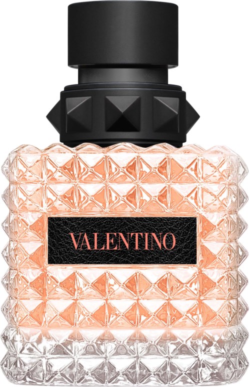 Ein Parfümflasche mit schwarzem Deckel und einem strukturierten, rosa und transparenten Glas. Das Etikett sagt "Valentino."