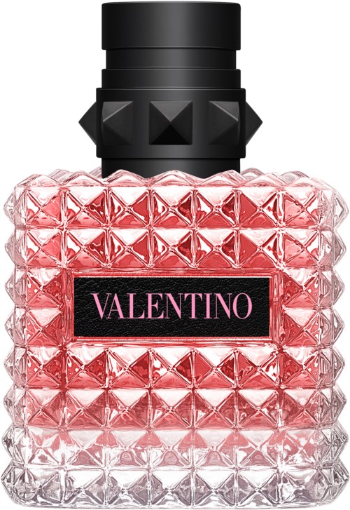 Een roze parfumfles met een textuurrijk diamantpatroon en een zwarte dop. Het etiket zegt "Valentino."