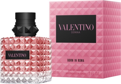 Een roze en zwarte parfumfles met een bijpassend roze doosje. De fles heeft een geometrisch patroon en het label zegt Valentin Donna.